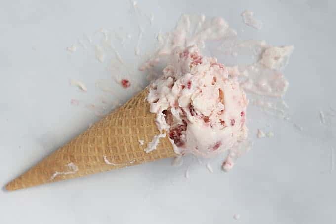 cone-of-strawberry-frozen-yogurt-on-counter