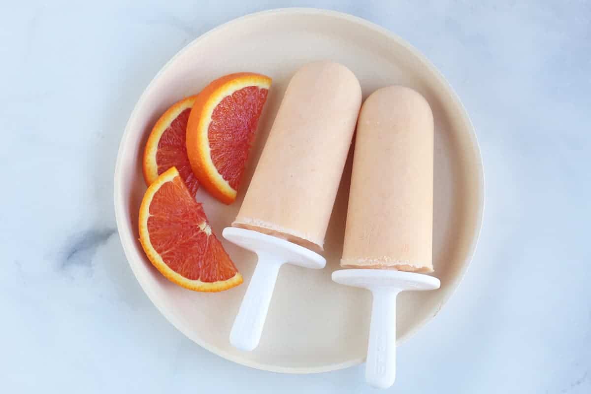 creamsicle-popsicles-on-white-plate