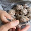 no-bake-energy-bites-in-container-with-hands