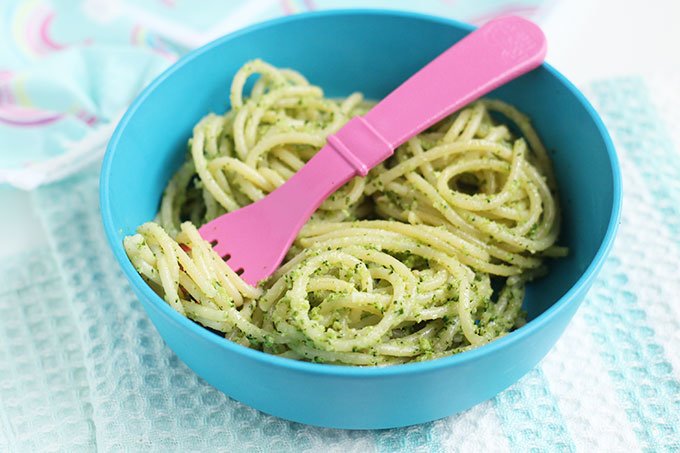 twirl of spaghetti with broccoli pesto in blue bowl