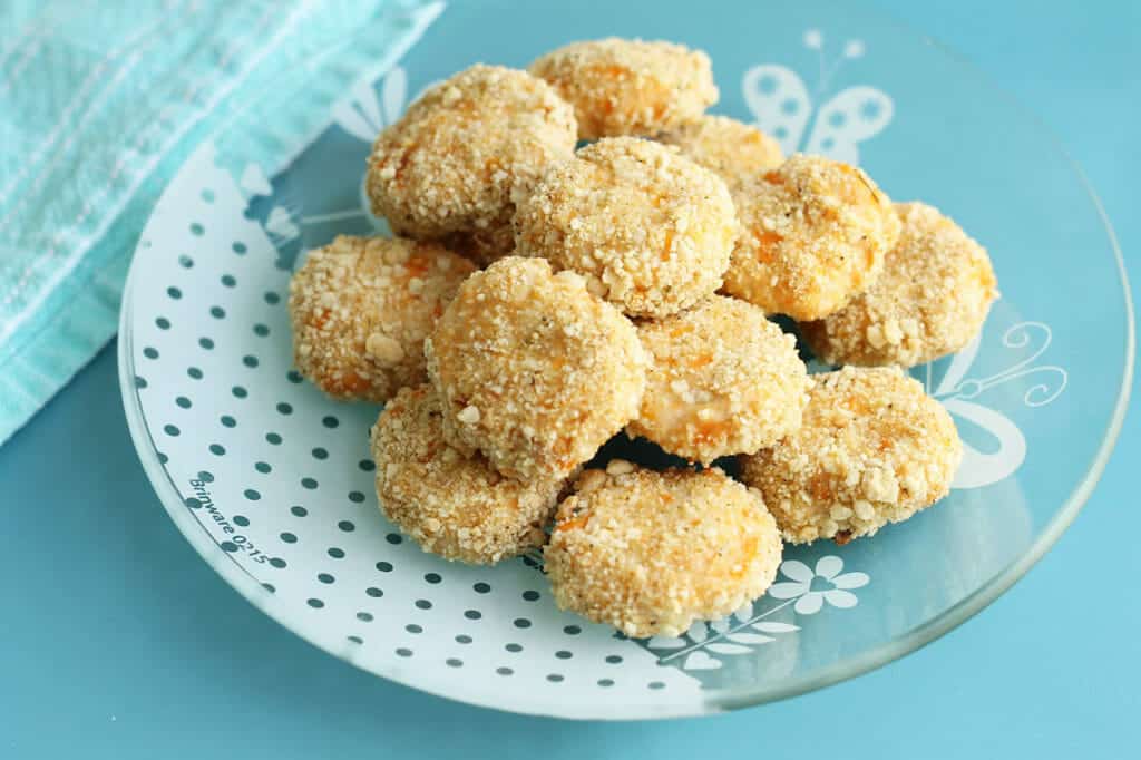 healthy homemade chicken nuggets on kids glass plate