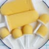 mango-popsicles on white plate