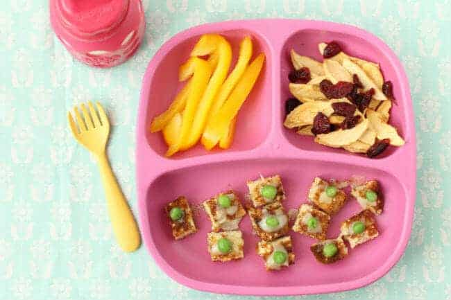 toddler meal idea cheesy veggie toast with bell peppers on pink plate