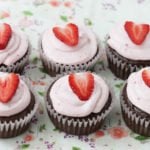 chocolate cupcakes in a row with strawberries