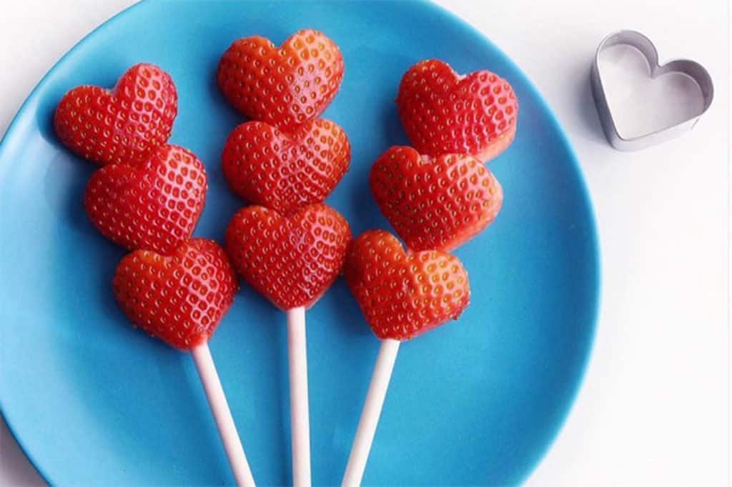 heart strawberries on lollipop sticks