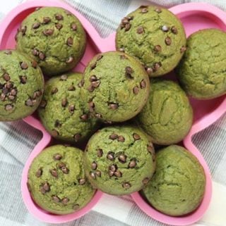 spinach banana muffins on pink plate