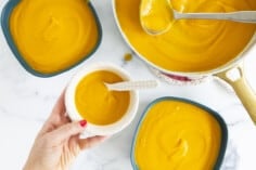 Butternut squash soup in various containers.