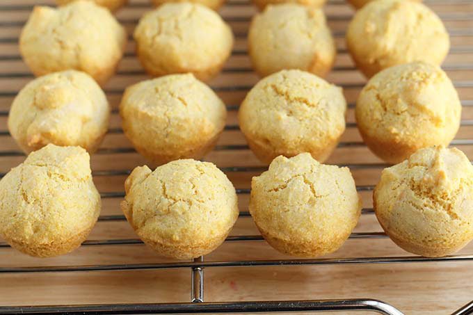 cornbread muffins cooling on wire rack