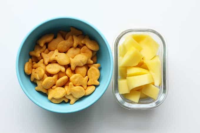 goldfish and mango in snack containers