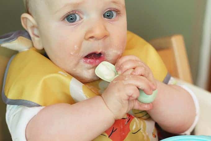 baby-eating-preloaded-spoon-of-yogurt