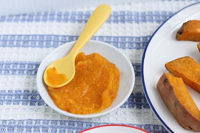 sweet potato puree for baby on white plate