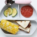 cut up vegetarian quesadillas for kids on plate