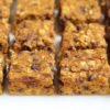 sliced pumpkin bars on cutting board