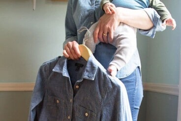 woman-holding-baby-with-denim-shirts