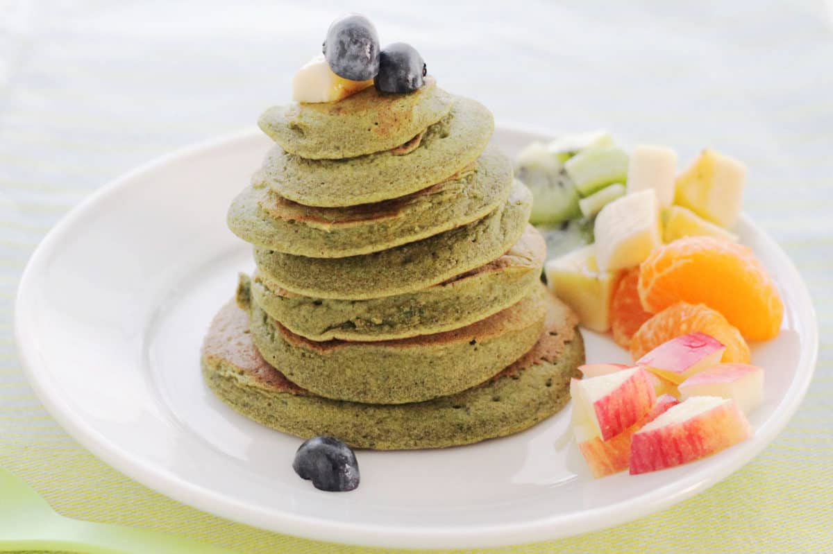 spinach-banana-pancakes-on-white-plate