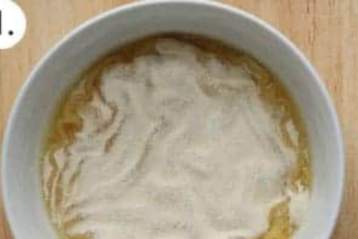 Liquid in pot for orange honey fruit snacks.