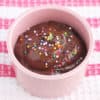 chocolate avocado pudding in pink cup