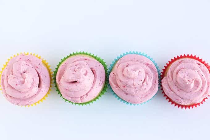 cupcakes-with-frosting-in-a-row