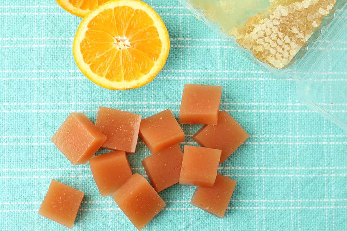 orange-fruit-snacks on teal tea towel