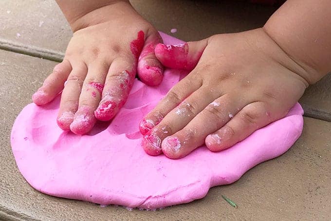 toddler-hands-with-pink-playdough