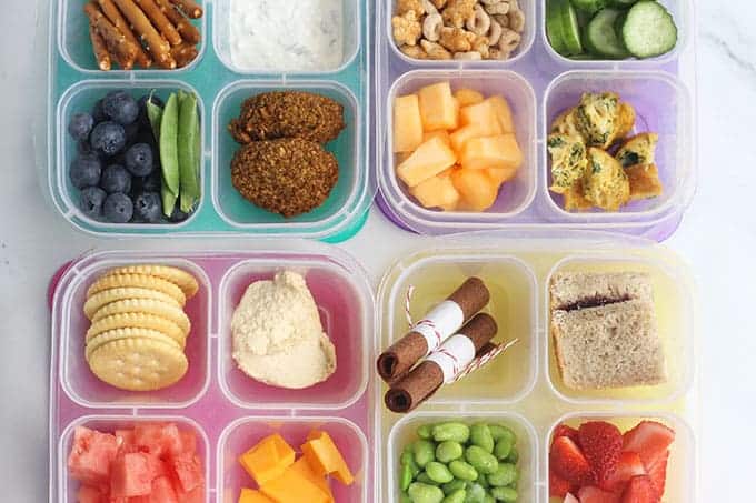 https://www.yummytoddlerfood.com/wp-content/uploads/2020/06/bento-lunch-box-ideas-on-countertop.jpg