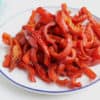 roasted-red-peppers-on-white-plate