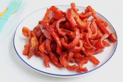 roasted-red-peppers-on-white-plate