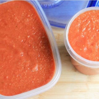 slow-cooker-spaghetti-sauce-in-freezer-containers in storage containers