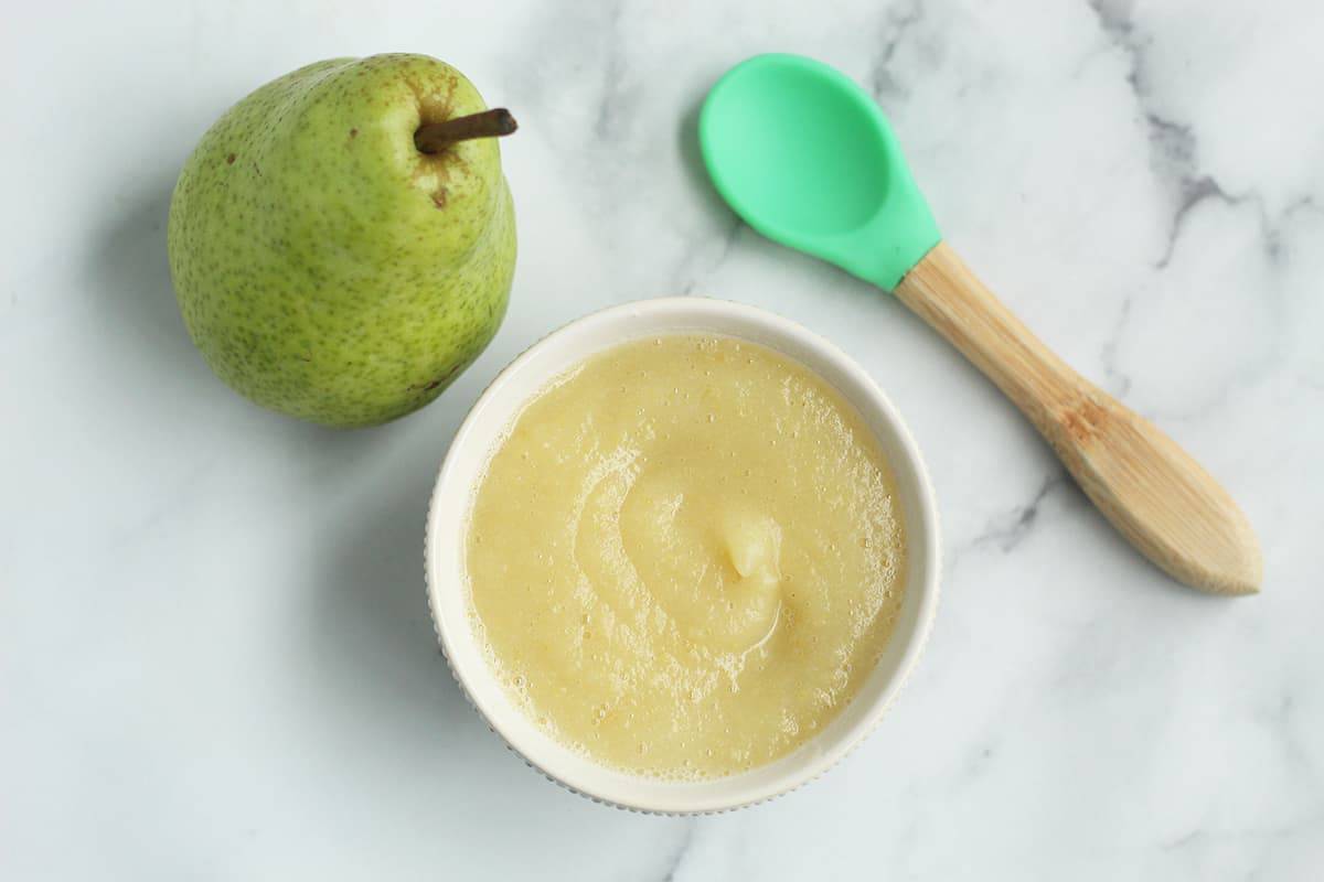 pear-puree-in-white-bowl-with-spoon