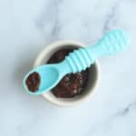 prune-puree-on-baby-spoon