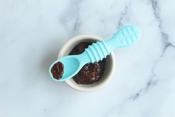 prune-puree-on-baby-spoon