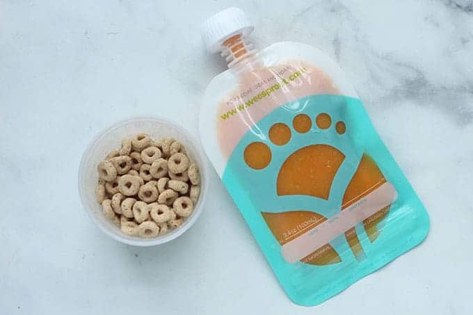 Cheerios-and-fruit-pouch-on-counter
