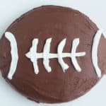 football cake on white cutting board