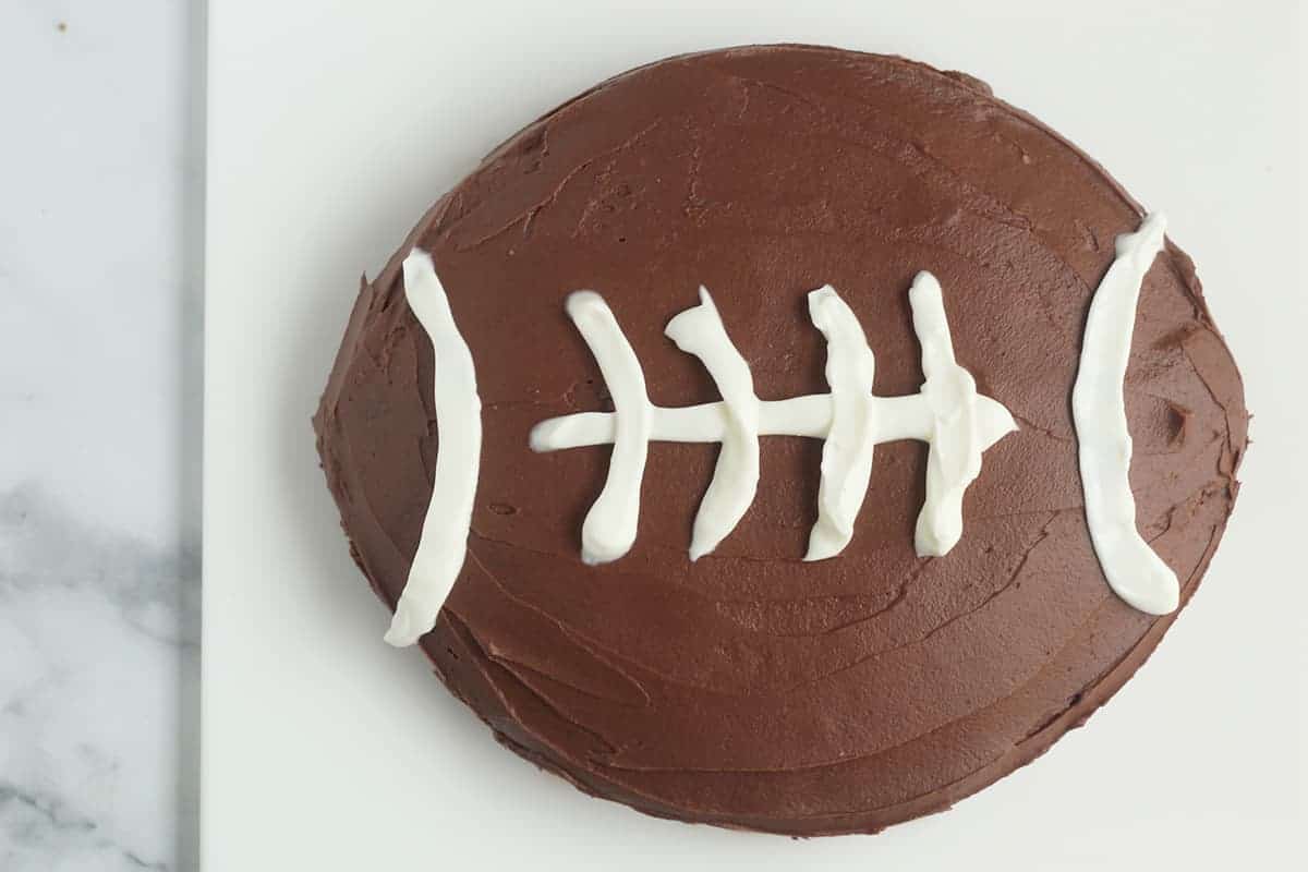 chocolate-football-cake-on-cutting-board