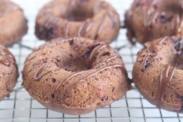 baked-cocoa-donuts on wire rack
