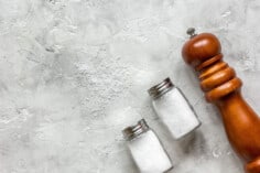 three-salt-shakers-on-counter