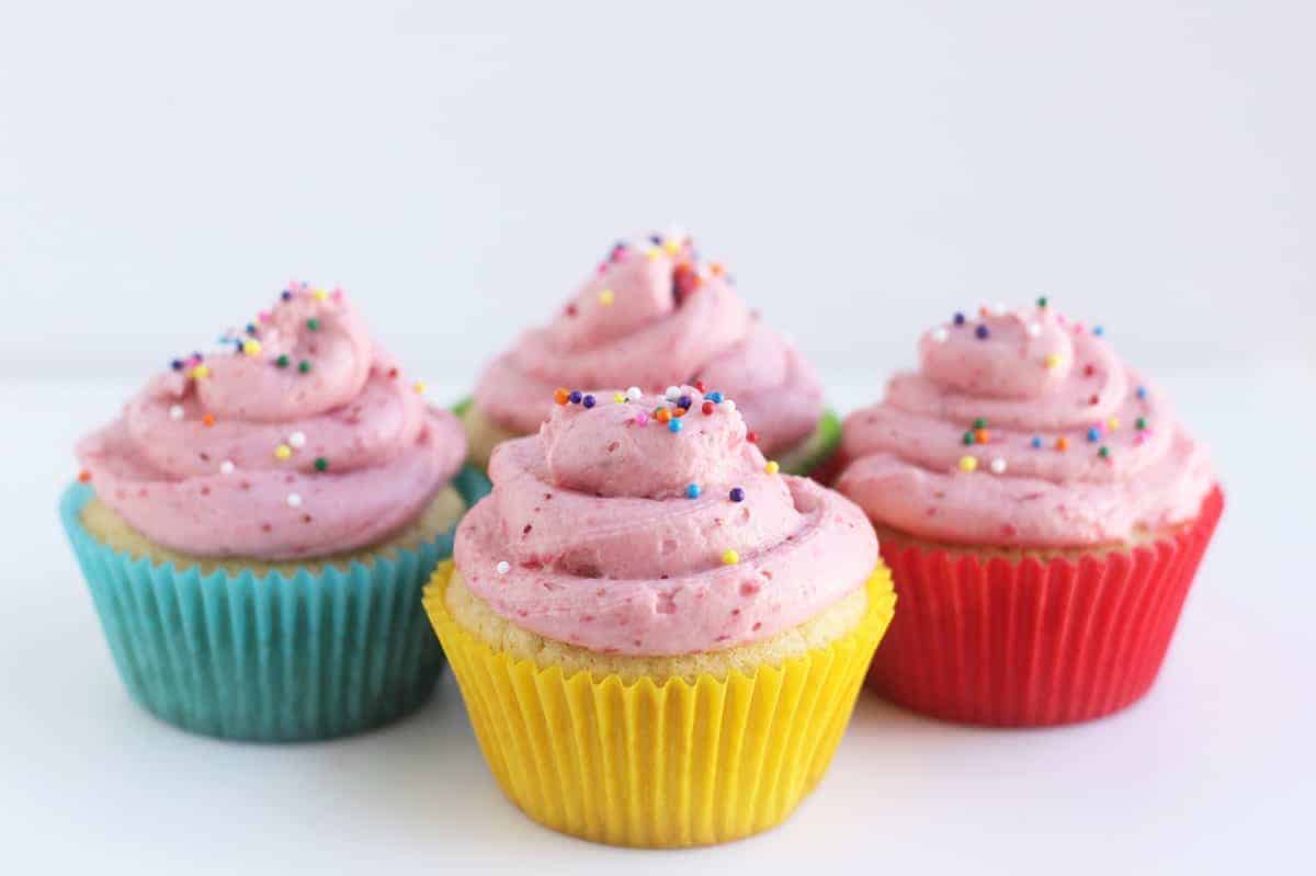 vanilla cupcakes with strawberry cream cheese frosting