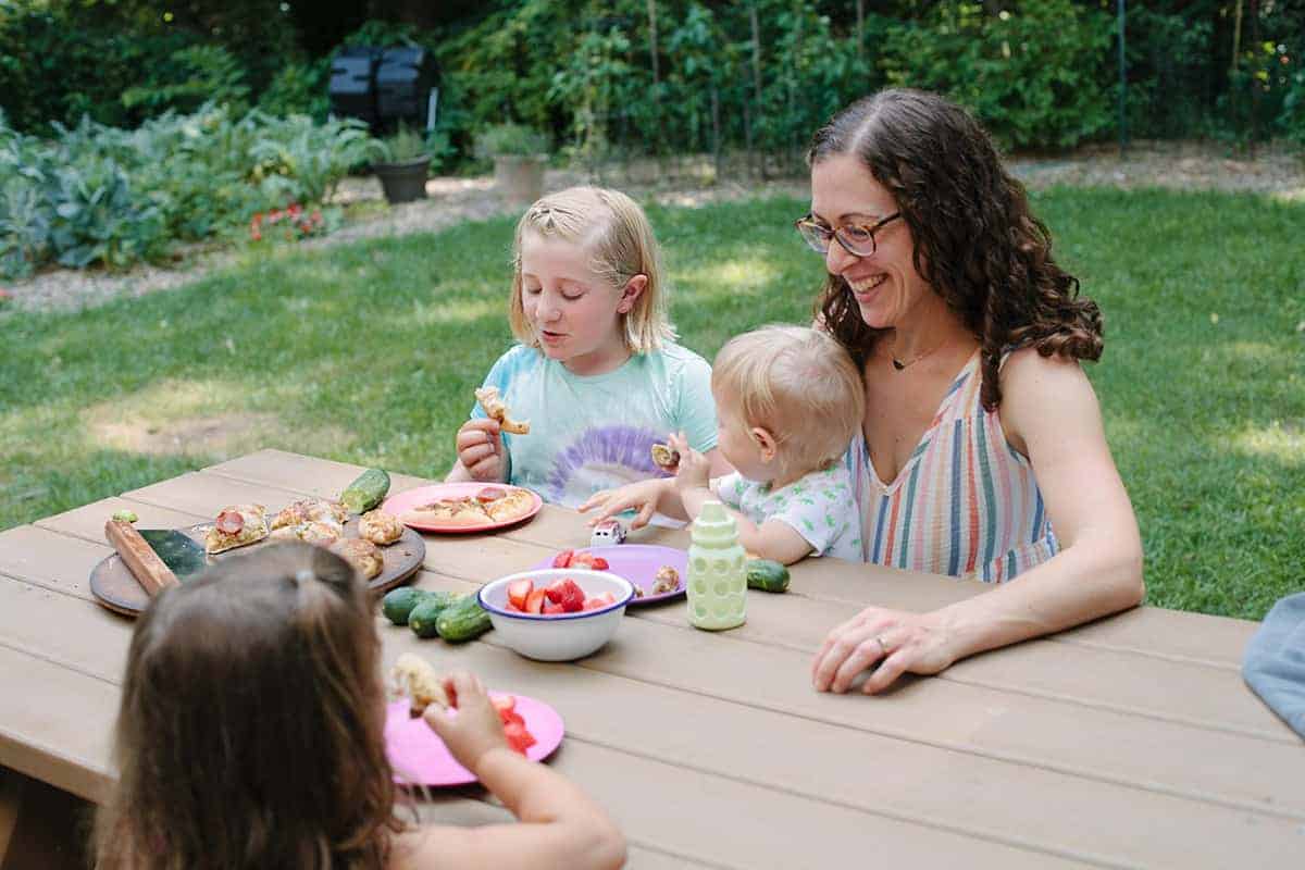 amy-at-picnic-table-with-kids