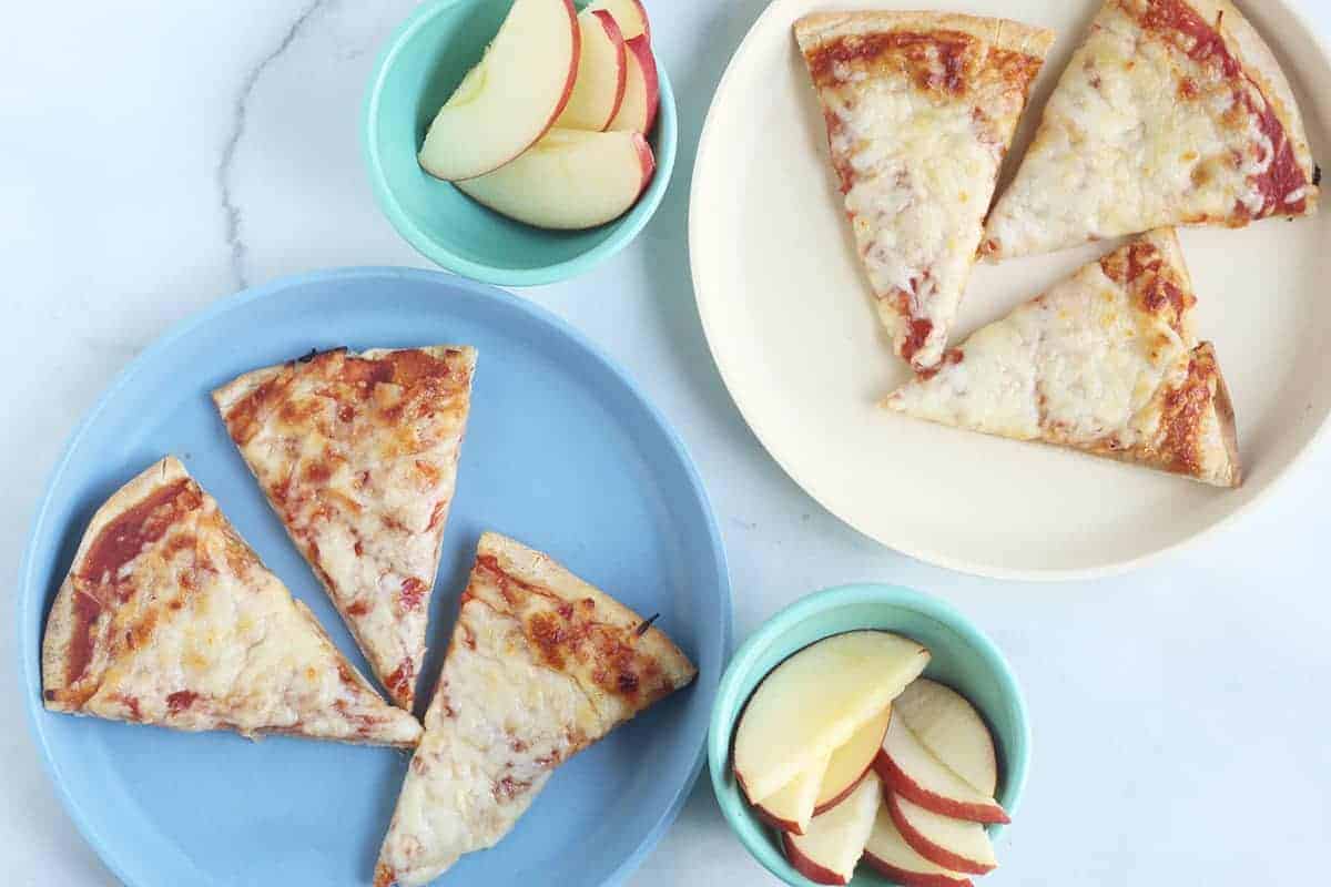 flatbread pizza on plates with apple slices