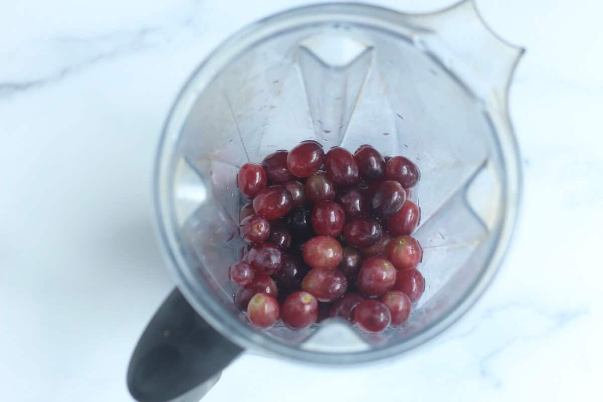 Grapes in blender for grape pops.