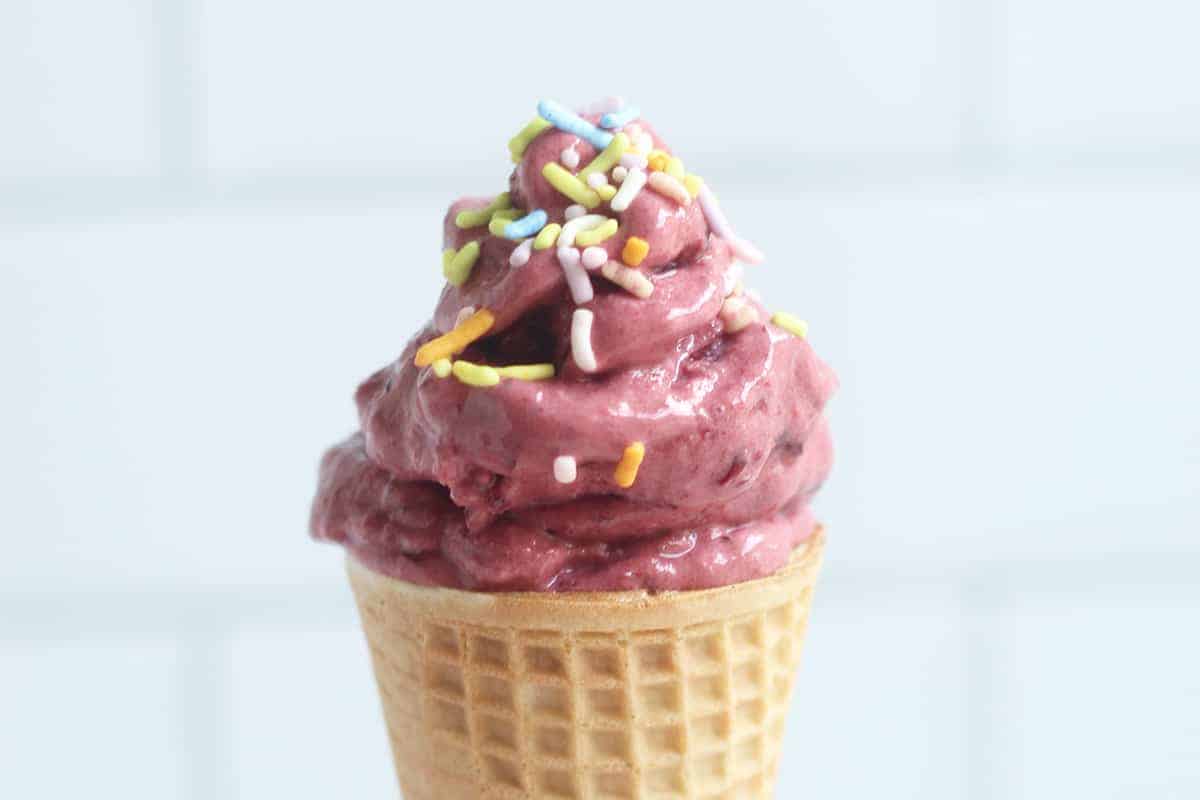 frozen yogurt in cone with sprinkles