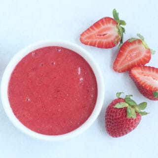 strawberry puree in white bowl