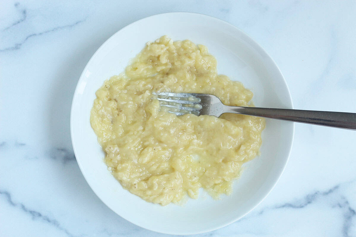 mashed banana in white bowls.