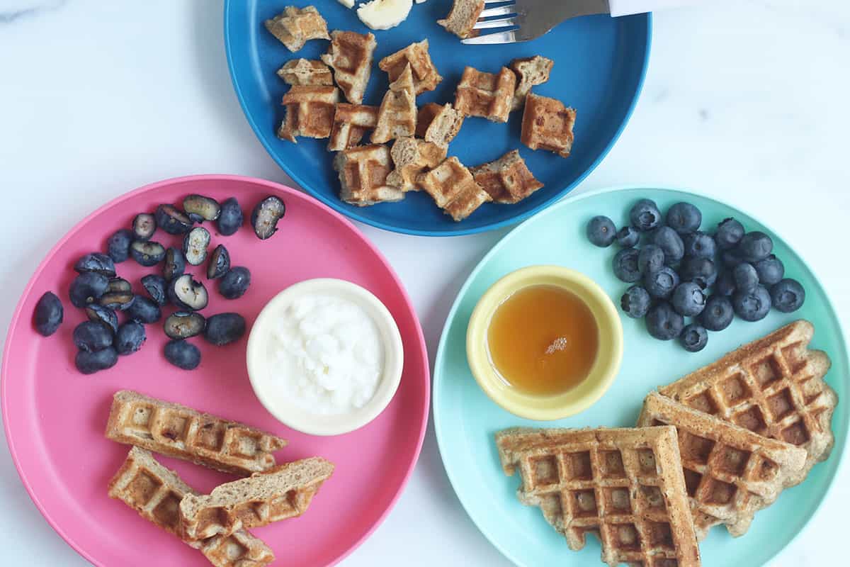 banana waffles on three plates.