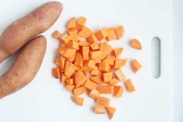 cut-sweet-potato-on-white-cutting-board