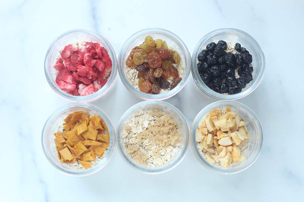 layered instant oatmeal cups with fruit and oats.