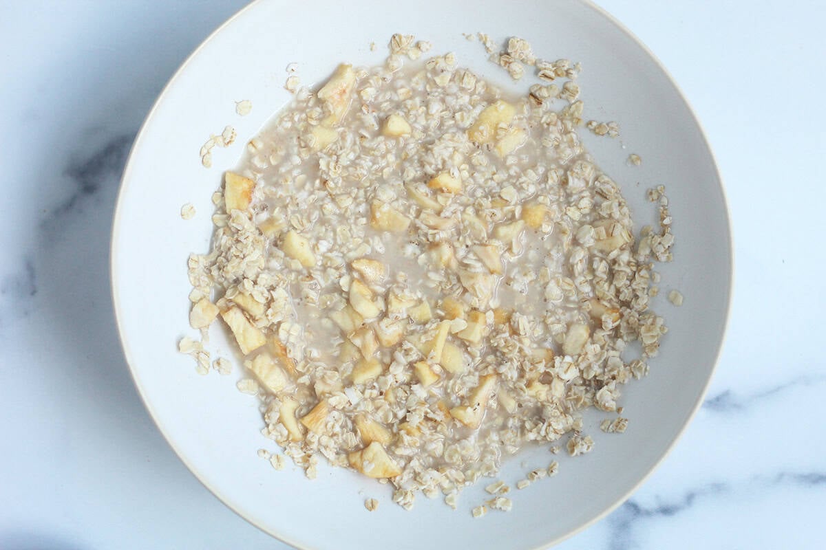 making instant oatmeal in a white bowl.