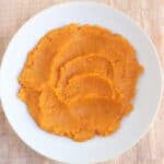 mashed butternut squash in white bowl