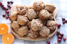 cranberry-muffins-on-wooden-plate