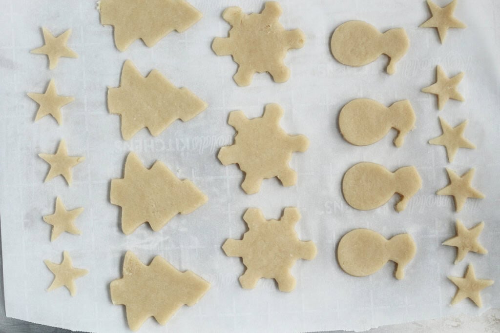 Christmas cookies on baking sheet before baking.